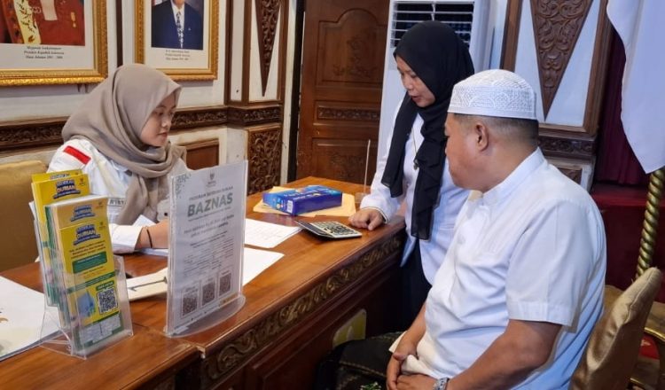 Muzakir Salurkan Zakat, Badan Amil Zakat Nasional Apresiasi Komitmen OPD Pemprov Jambi.Foto:dok.ist
